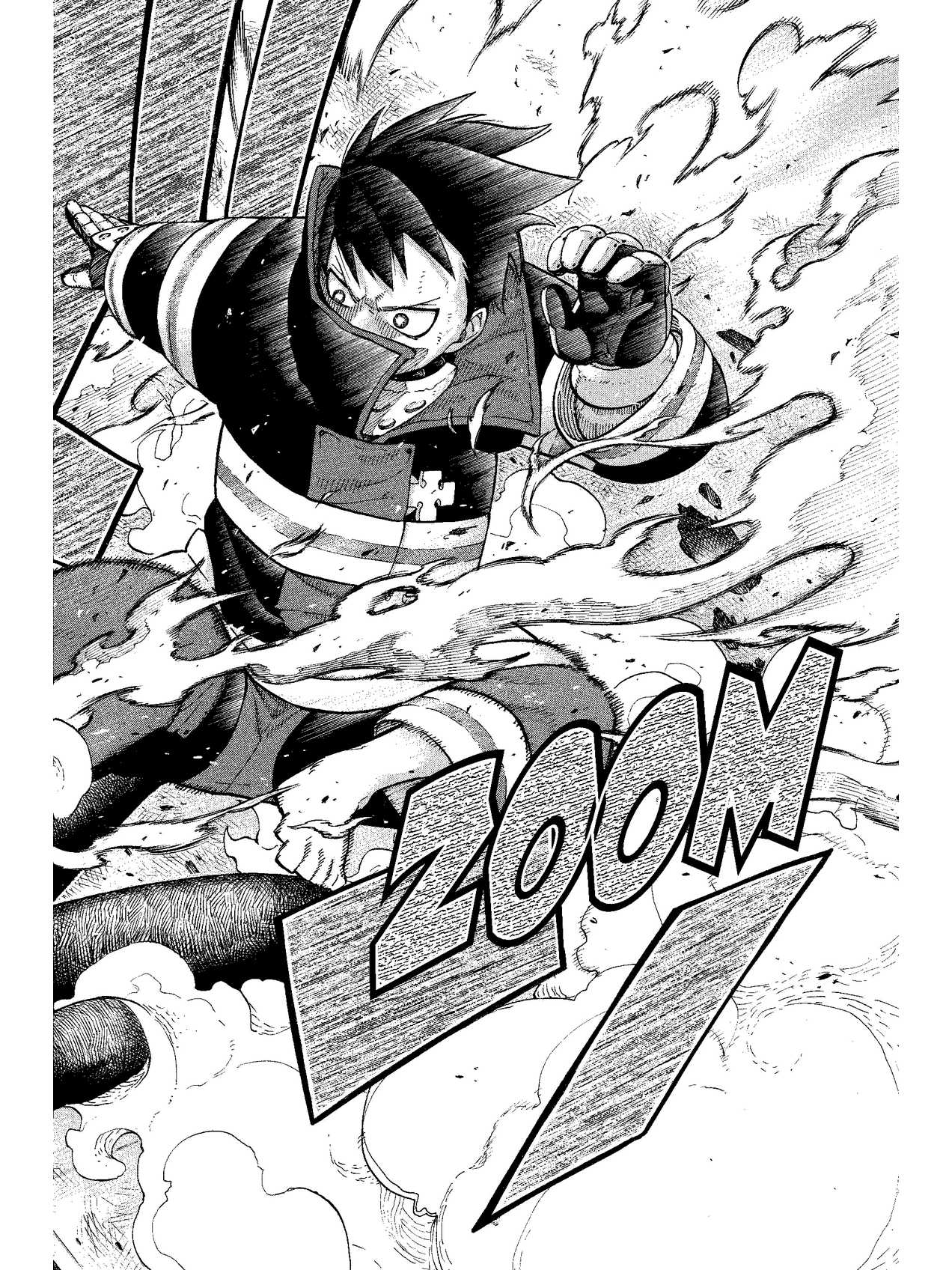 A page from Fire Force volume 1, delivered and open on a Kindle Paperwhite leaning on the pillow.